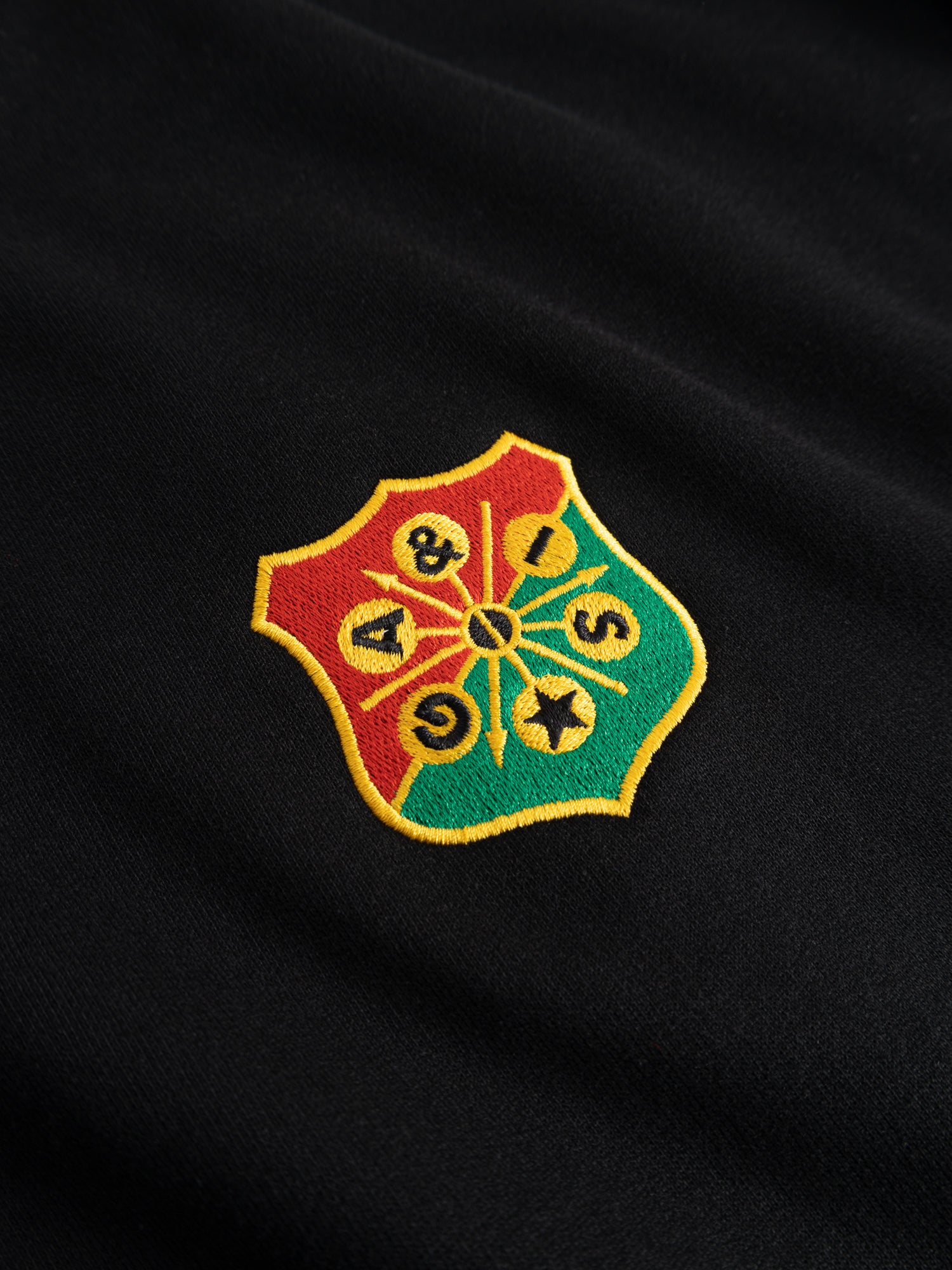 Sweatshirt svart emblem litet