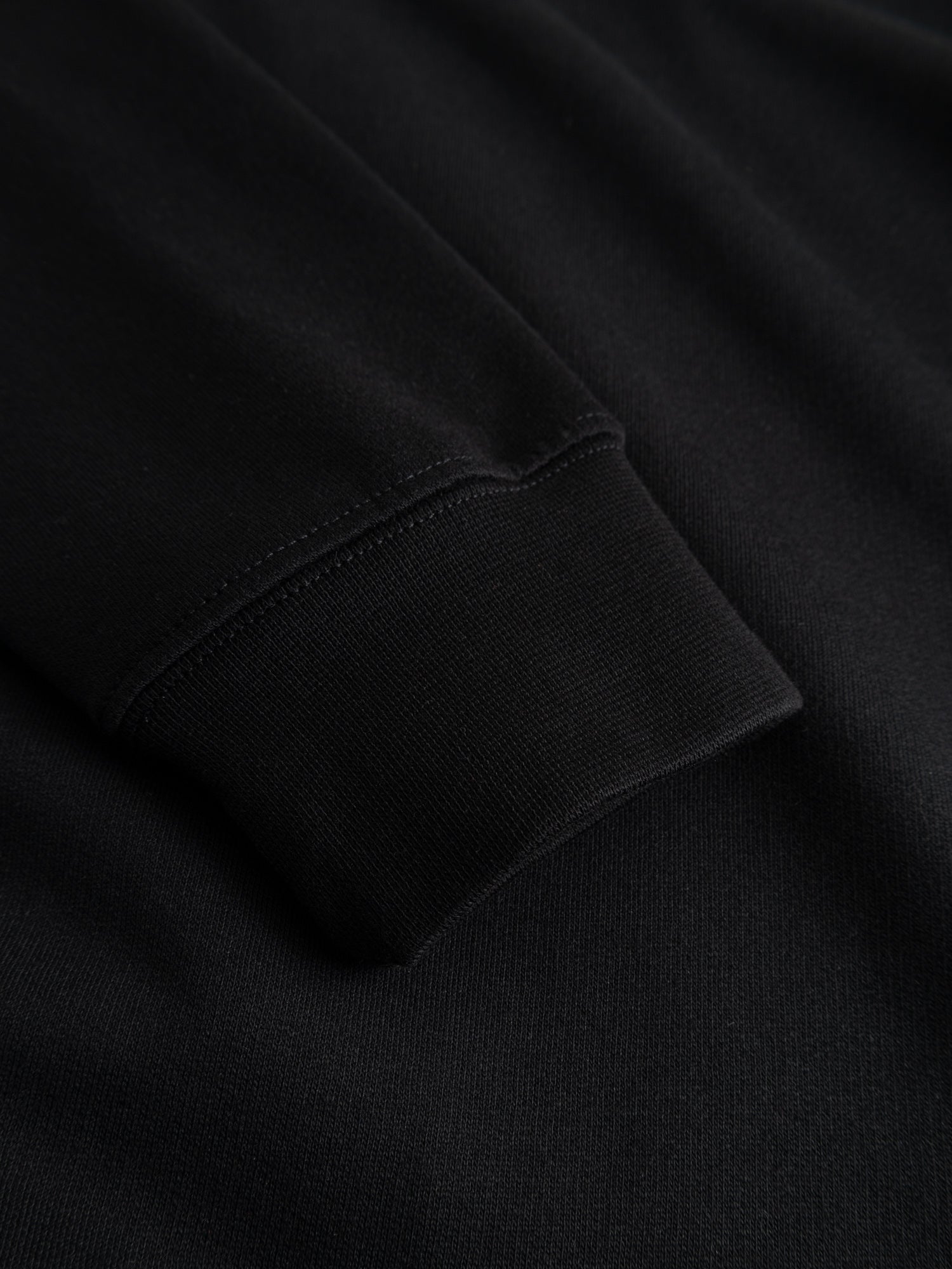 Sweatshirt svart emblem litet